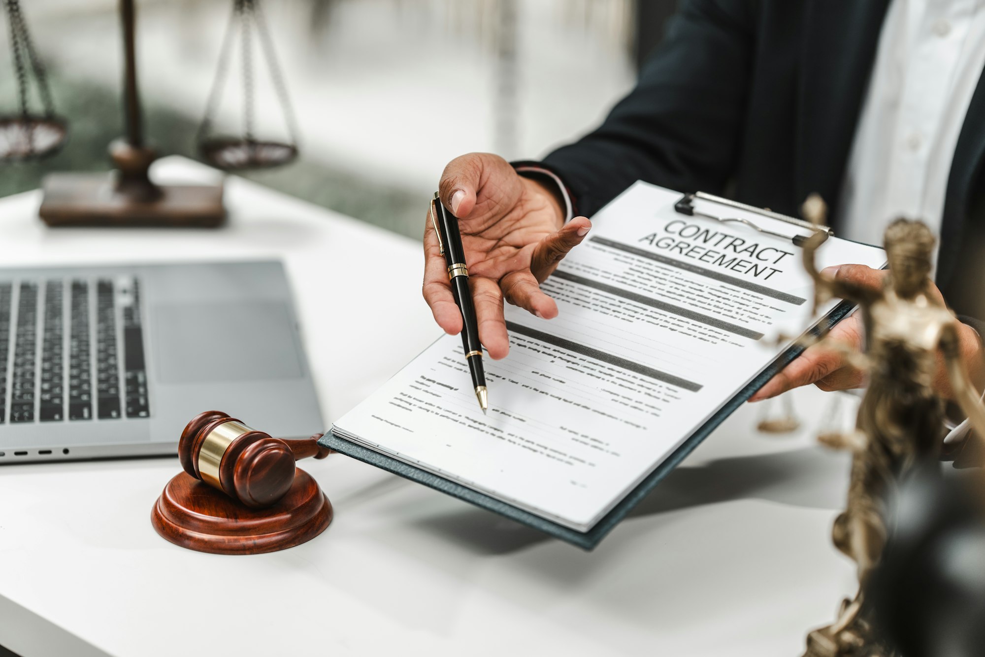 Handsome businessman lawyer of Indian descent. trusted litigation lawyers attorneys.